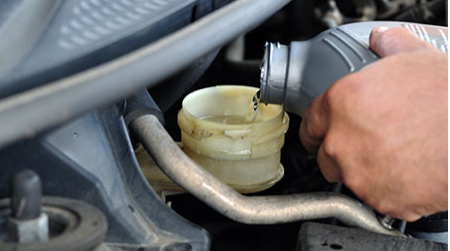 Find a store near you to have your brake fluid serviced. Image of brake fluid service.